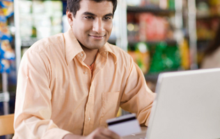 man working at a laptop